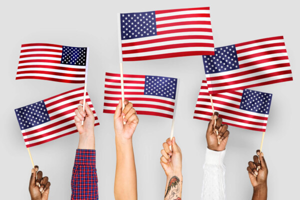 People holding American flags