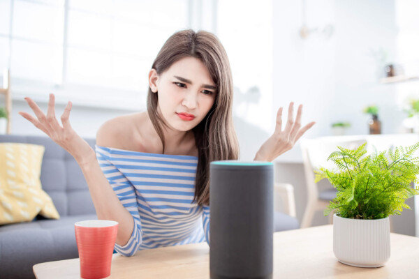 Woman using digital assistant Alexa