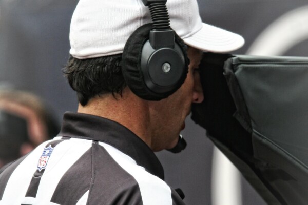 NFL Referee Looking at Instant Replay