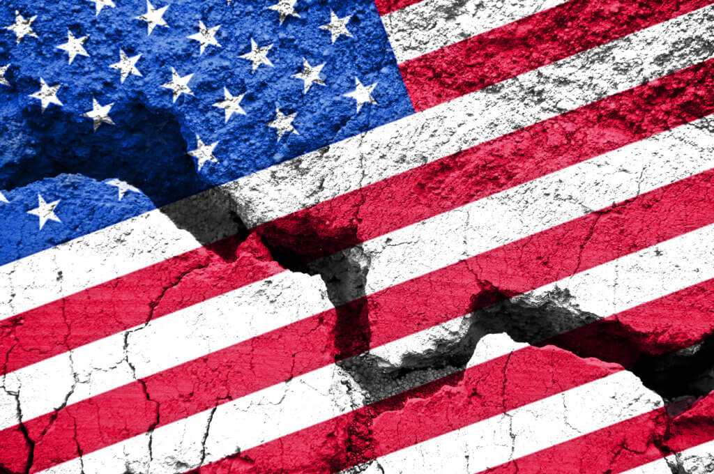 Cracked, split American flag indicates divided country