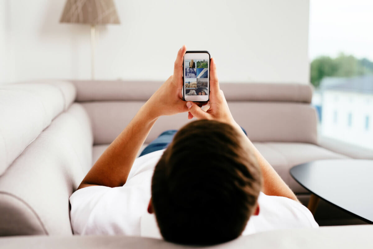 Man browsing internet on his smartphone