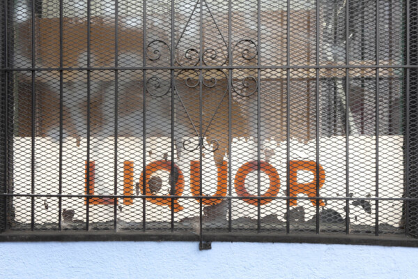 Liquor store sign in window