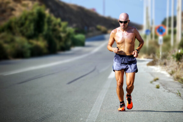 Man running outside on street