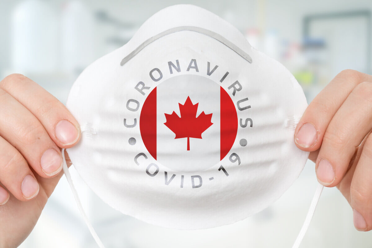 Respirator mask with flag of Canada – Coronavirus COVID-19 concept