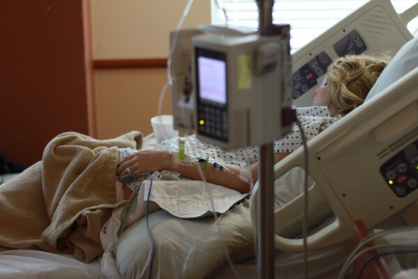 Woman in hospital bed