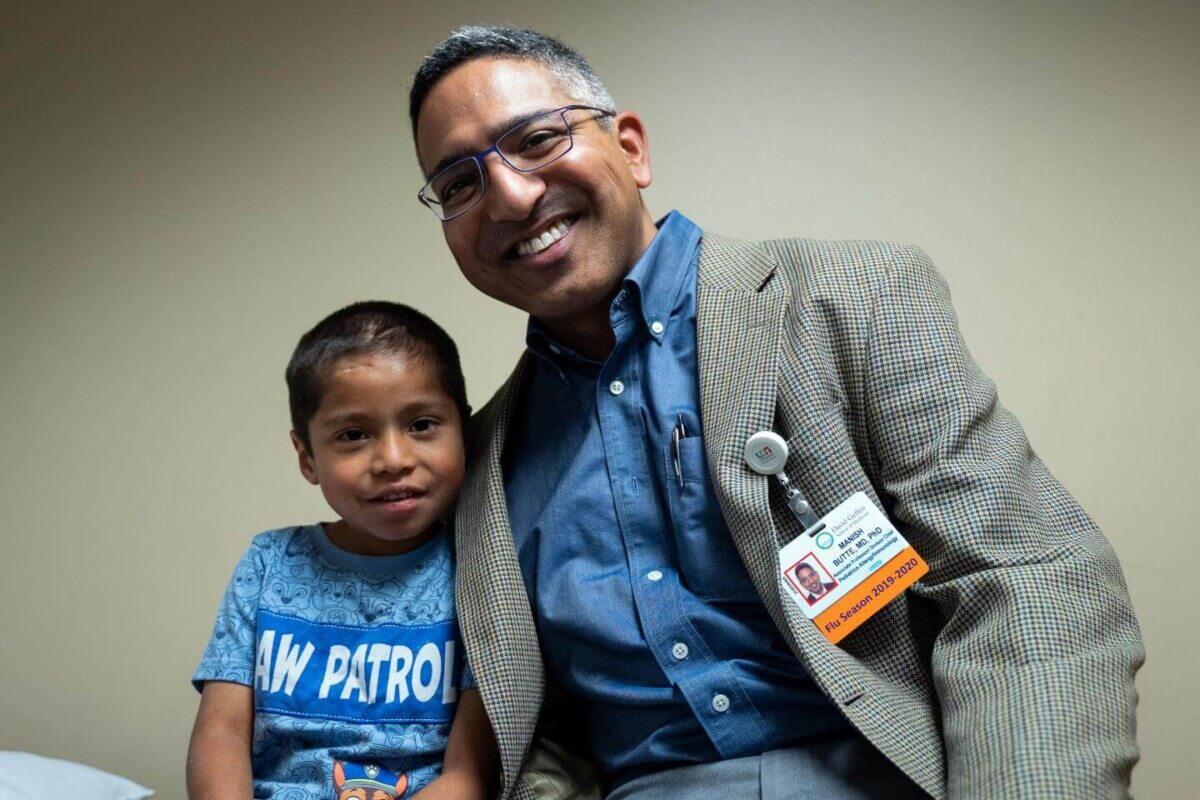 Dr. Manish Butte with Abraham Gonzalez-Martinez