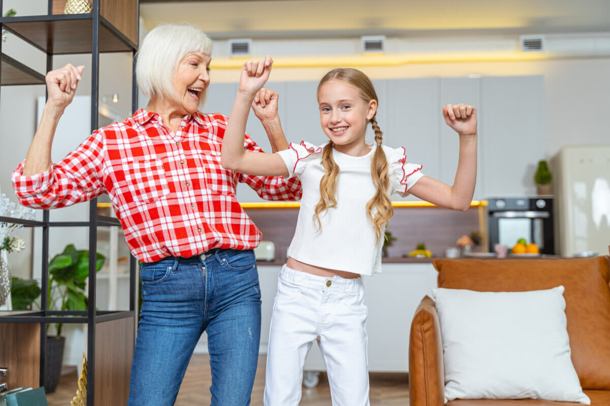 Happy grandmother looking at her gleeful grandchild