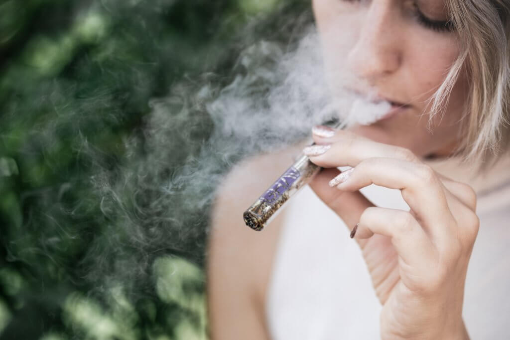 Woman smoking marijuana