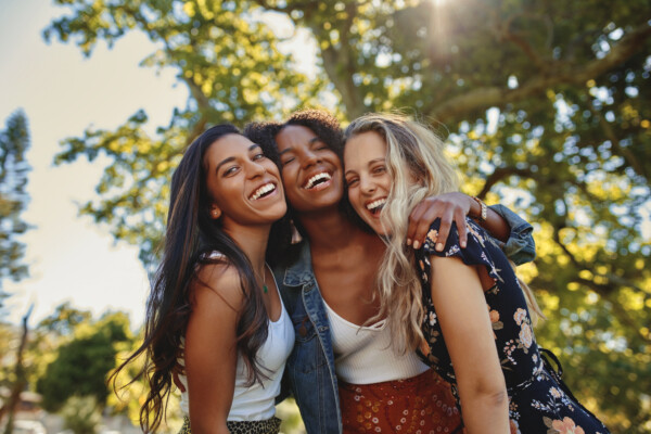Group of women friends hugging