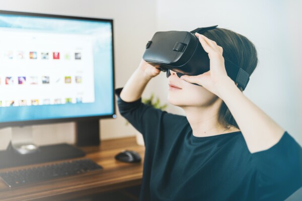 Woman using virtual reality goggles