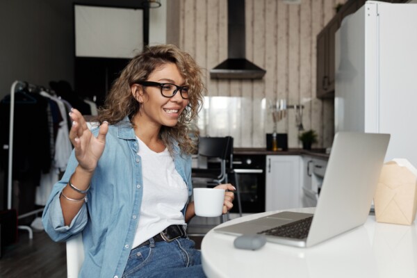 Woman on video chat on laptop