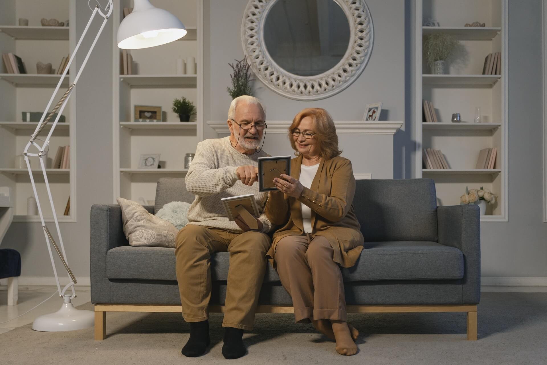 Older couple looking at photos