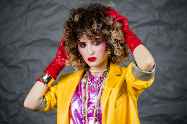 Woman from 1980s hairstyle, clothes