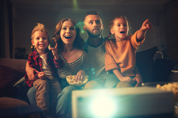 Family watching a movie