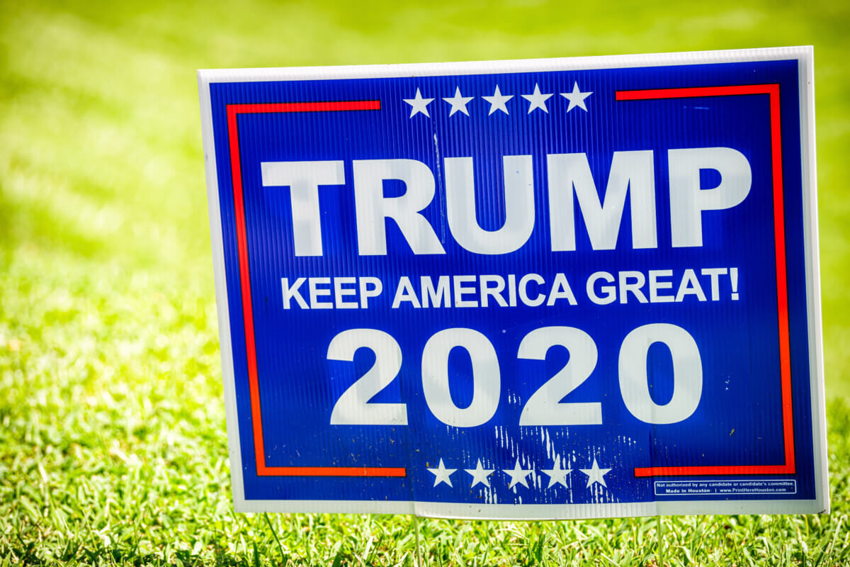 Afton, USA – August 30, 2020: Presidential election political sign placard in support of Donald J. Trump with Keep America Great 2020 text in rural countryside Virginia farm with green grass lawn