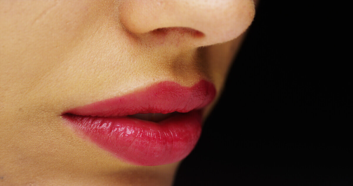 Woman’s red luscious lips