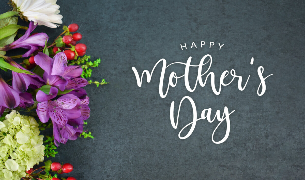 Happy Mother’s Day Calligraphy Text with Beautiful Flowers Bouquet and Black Texture Background