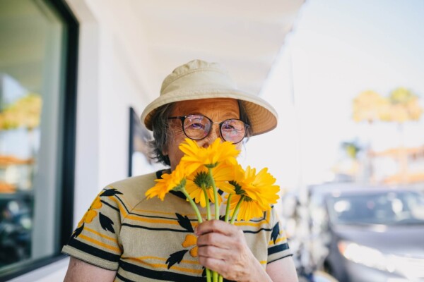 elderly person smelling
