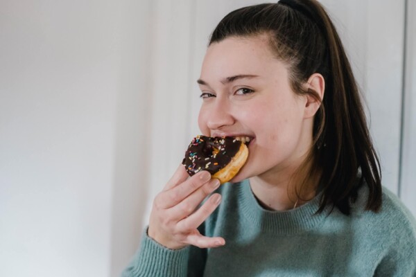 woman eating chocolate