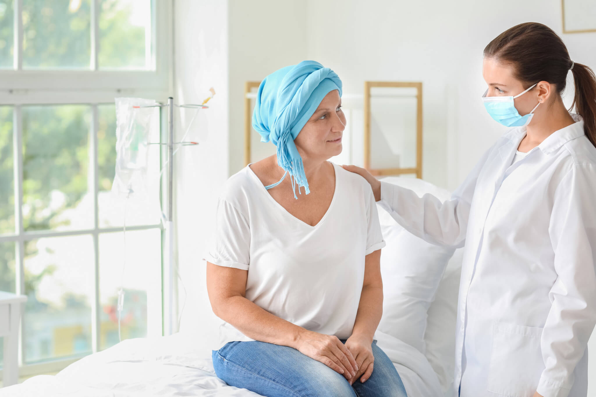 Doctor talking to cancer patient