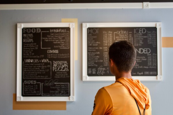 Customer looking at menu