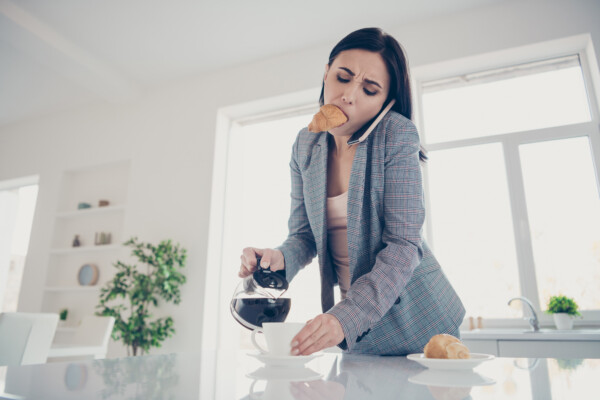 Woman in a hurry getting ready for work in the morning