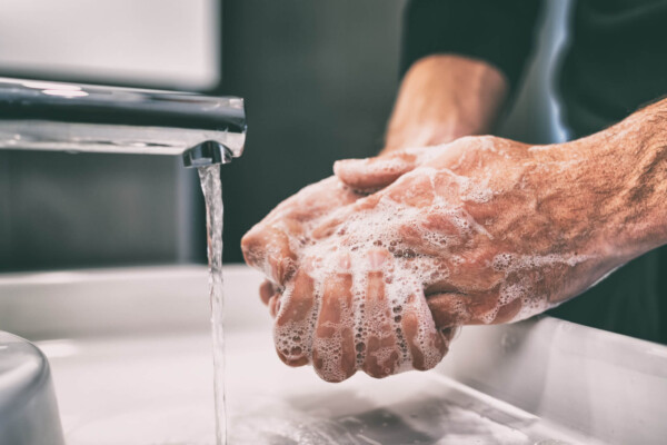 Man washing his hands