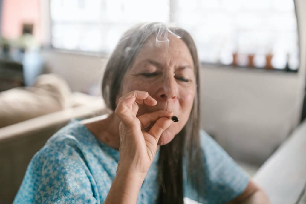 woman smoking marijuana