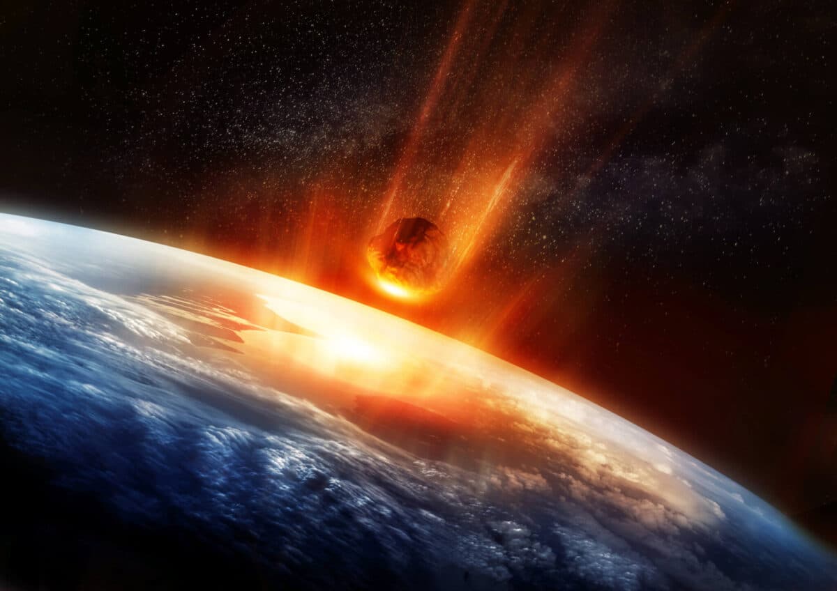 A large Meteor burning and glowing as it hits the earth’s atmosphere. 3D illustration.
