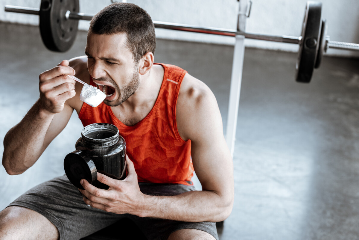 Man eating protein powder