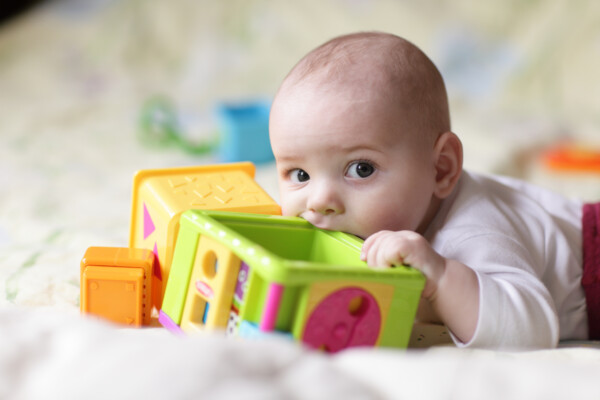 Baby teething on toys