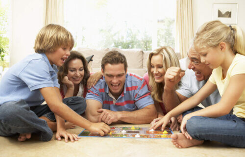 Family playing board game