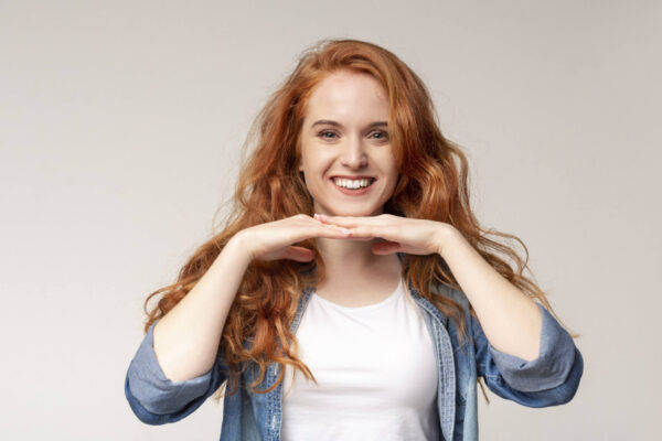 Redhead woman happy, smiling