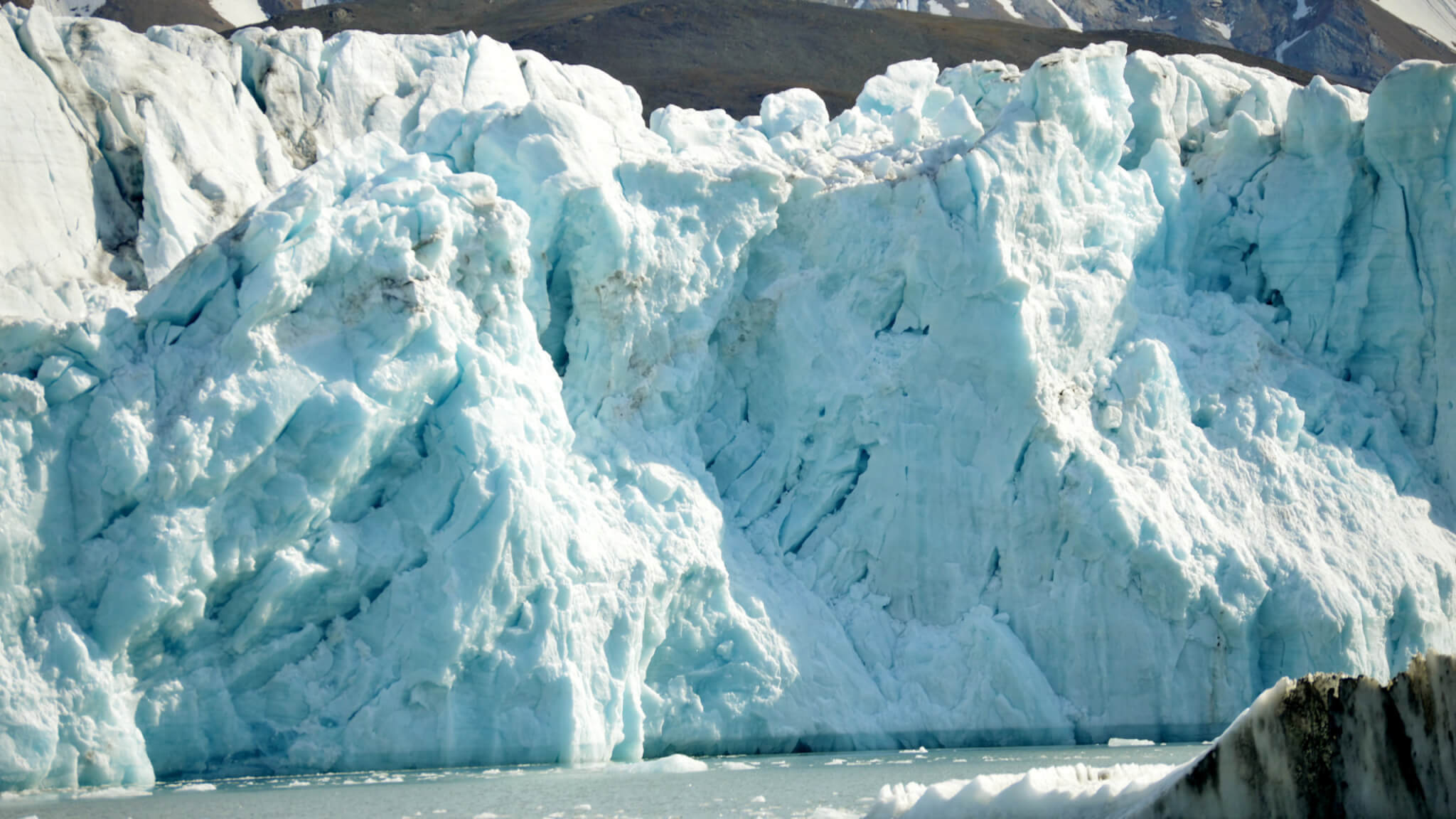 Tidewater ice glaciers receding and melting in the ocean
