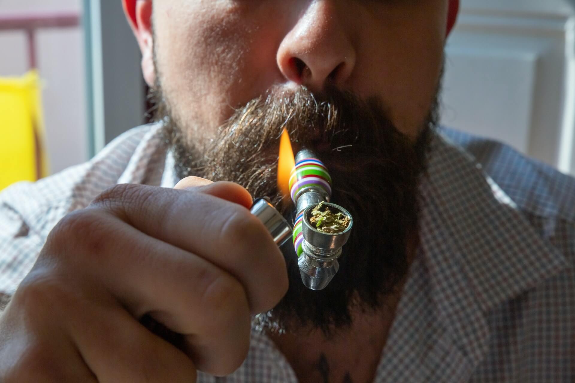 man smoking cannabis