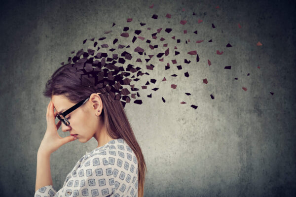 Young woman suffering from brain issue, stress, headache