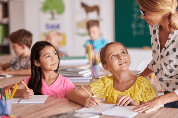 Students, teacher in classroom