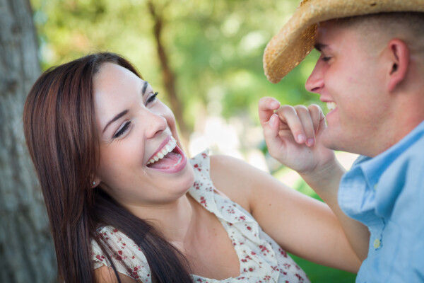 Happy couple on date laughing