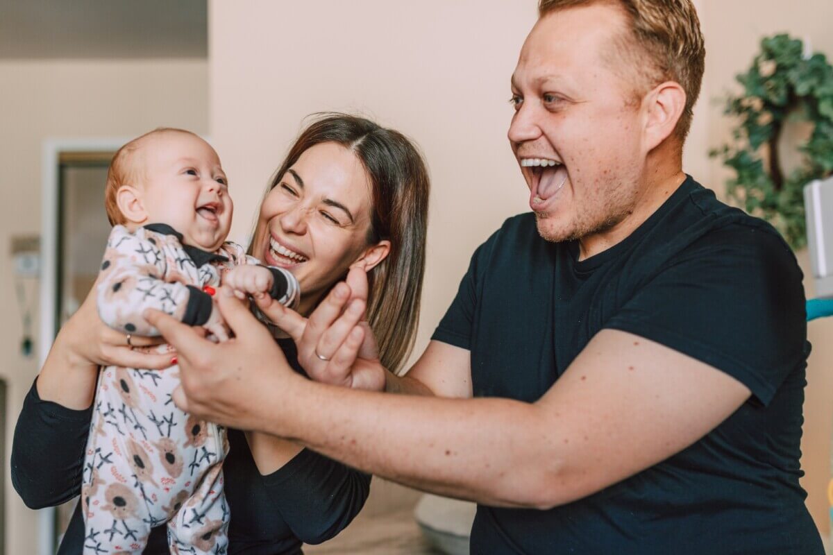 Mother and father with baby