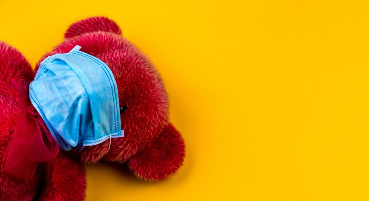 Teddy bear with face mask: COVID-19 in children