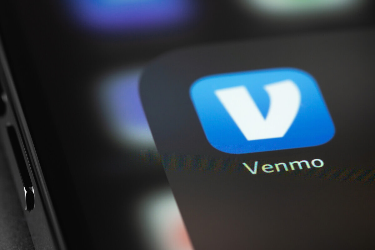 Venmo mobile icon app on screen smartphone iPhone macro. Venmo i