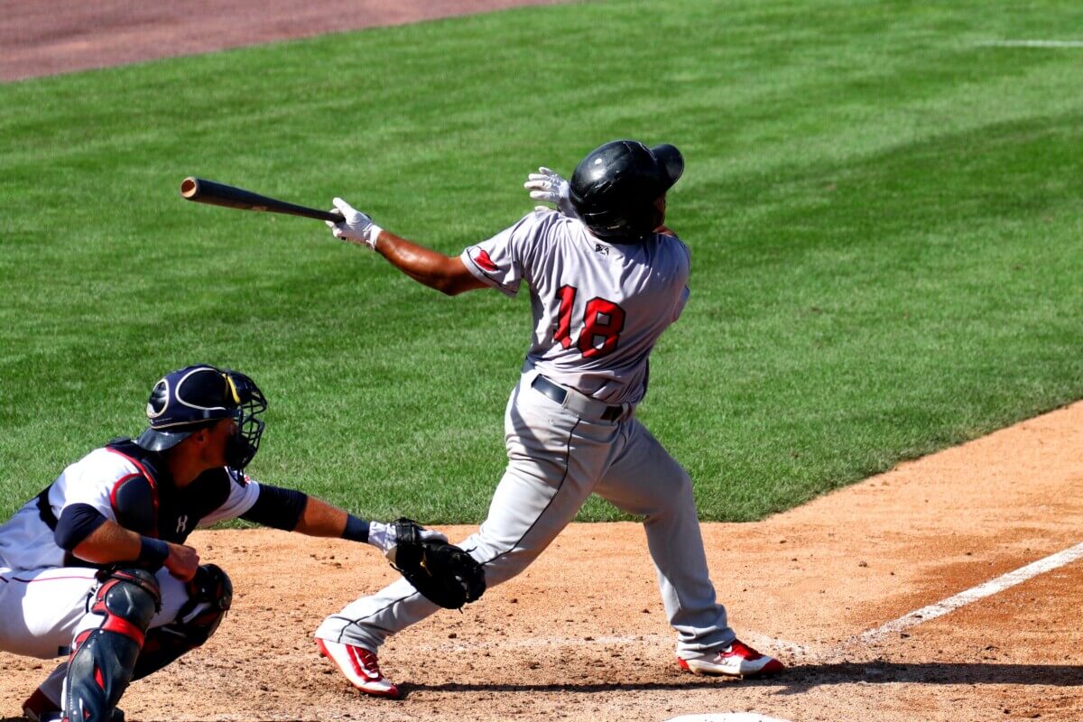 Baseball player hitting home run