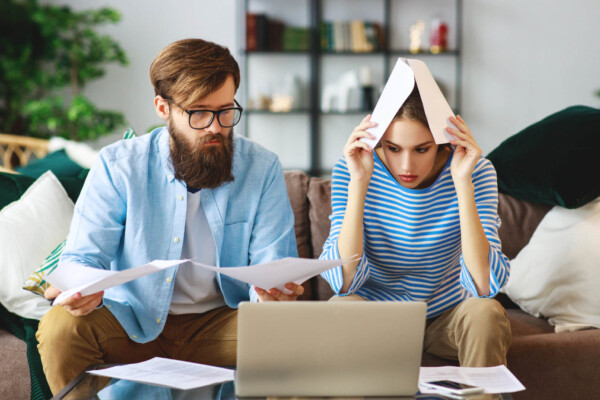 Couple stressed over money, budget, bills, debt