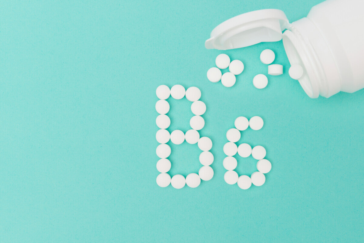 Bottle with Vitamin B6 Pills Forming the Word ‘B6’