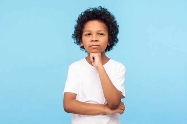 Child thinking, unsure or bored