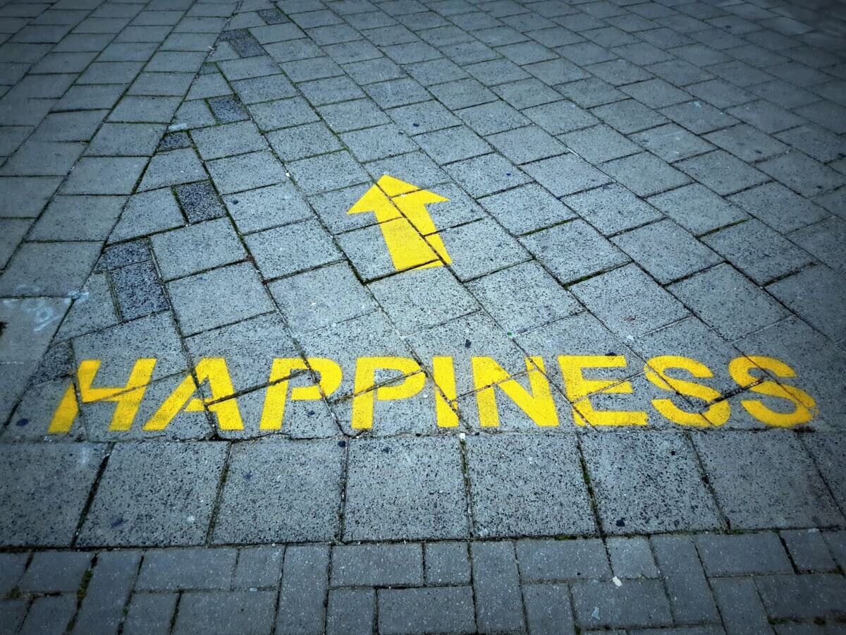 Happiness path printed on a sidewalk