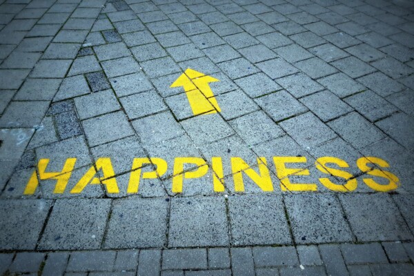 Happiness path printed on a sidewalk