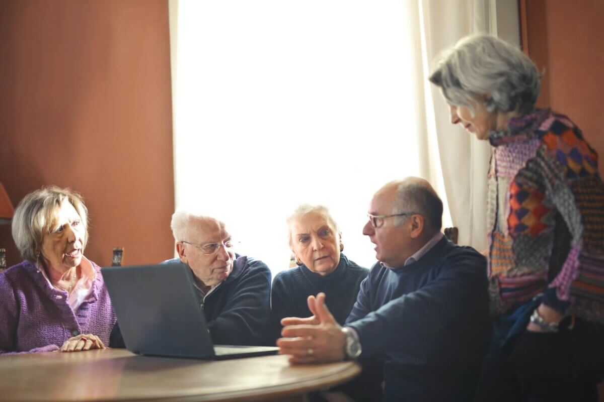 older people watching screen