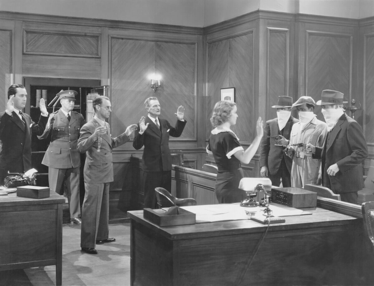 Armed bank robbery image from mid-1900s