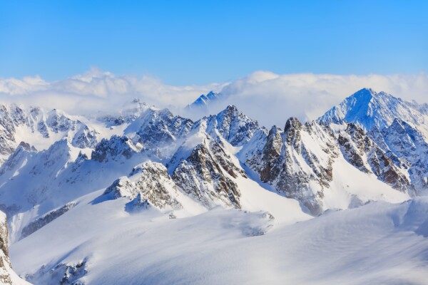 Wintertime view from Mt. Titlis in Switzerland. The Titlis is a mountain, located on the border between the Swiss cantons of Obwalden and Bern.